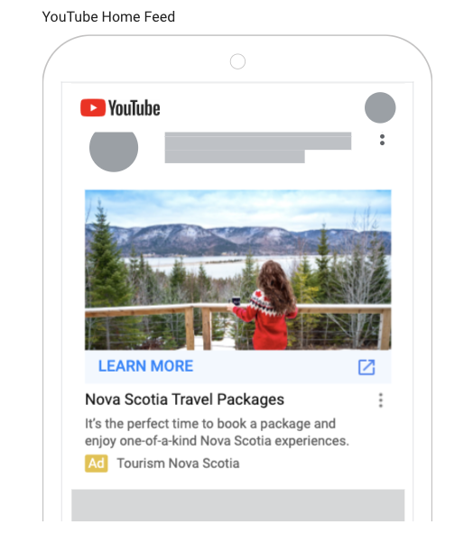 Sample of an ad on YouTube shows a woman leaning on a railing looking out over snow covered mountains.