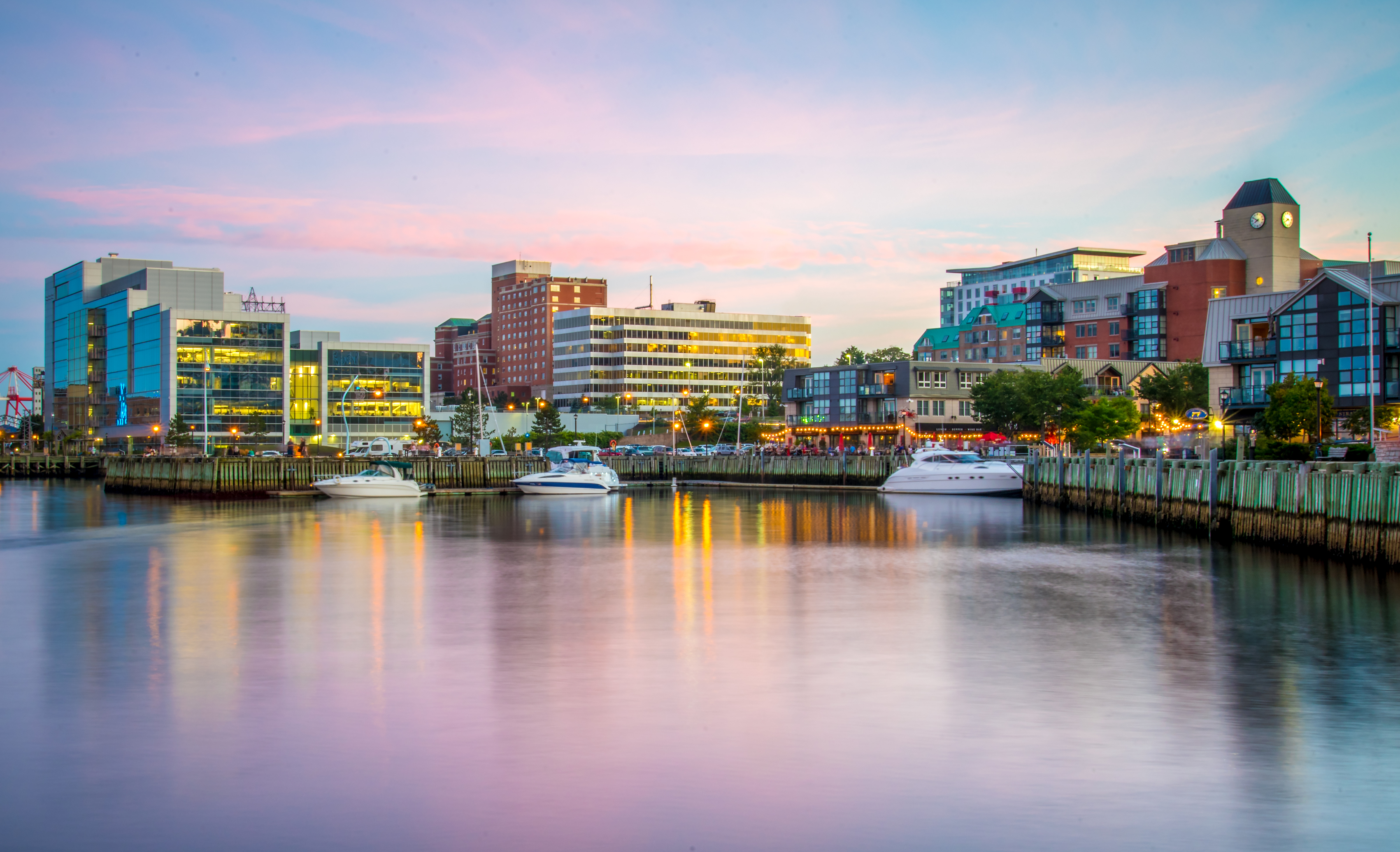 Halifax waterfront viewed from the harbour at sunset.