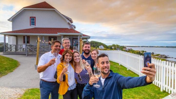 Group taking a selfie at Cape Forchu