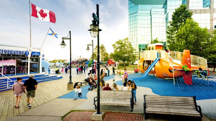 People at the playground on the Halifax waterfront near the visitor information centre.