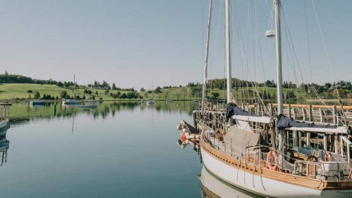 Two small boats docked on a wharf